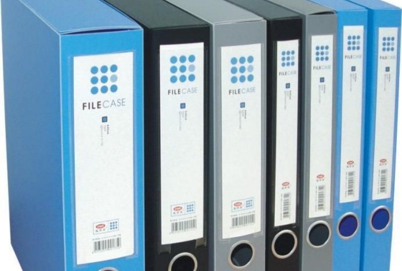 Side-by-side comparison: acid-free label (left) remains intact after aging test, while traditional label (right) shows peeling and discoloration.