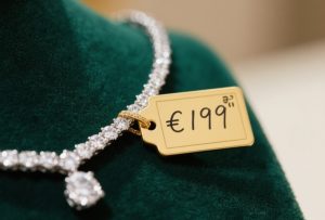 Handwritten PVC jewelry price tags on diamond necklace - Smudge-proof custom labels by Gemmylabel