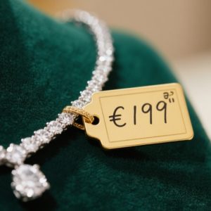 Handwritten PVC jewelry price tags on diamond necklace - Smudge-proof custom labels by Gemmylabel