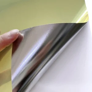 Close-up of GemmyLabel Gold PET Label Material - Durable self-adhesive gold sticker with scratch-resistant metallic coating