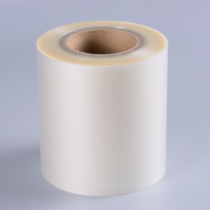 Washable and removable transparent film self-adhesive label on a beer bottle