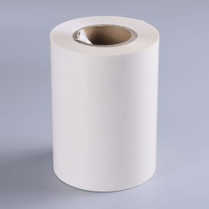 Transparent cellulose self-adhesive label material showing smooth surface and wood fiber composition for eco-friendly packaging