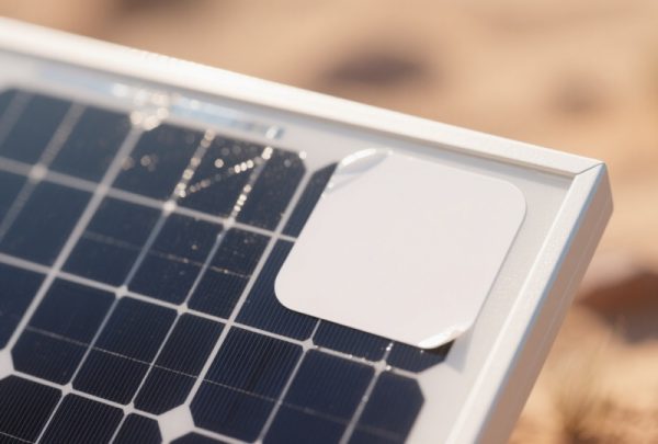 High-adhesion solar panel label with glossy surface in desert environment