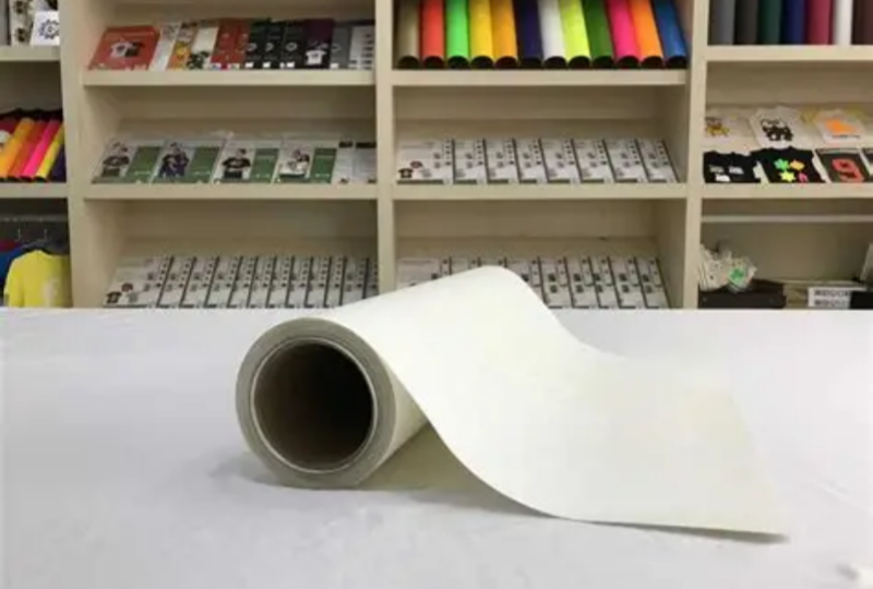 Close-up of applying a heat transfer to a shirt using a professional heat press machine