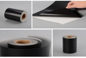 Assortment of custom die-cut glossy black PET film labels on a roll.